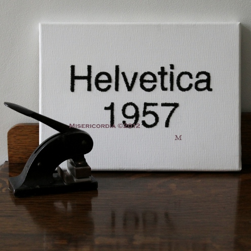 Helvetica hand embroidered canvas - Misericordia 2012