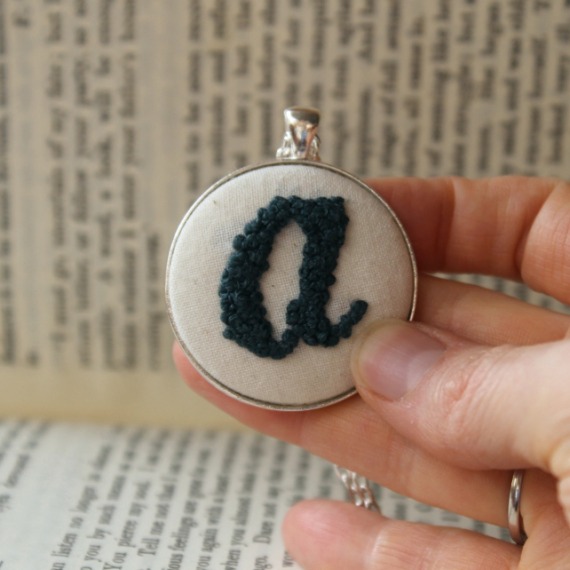 Hand embroidered letter pendant - Misericordia 2014wa detail